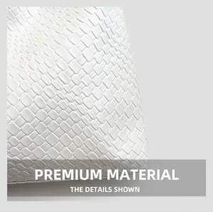 Close-up of premium white woven leather texture on a stylish women's shoulder bag
