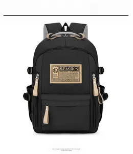 Detail of black commuter backpack with SLFASHION patch and beige zipper pulls