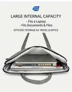 Spacious main compartment of grey laptop bag holding tablets and thick books
