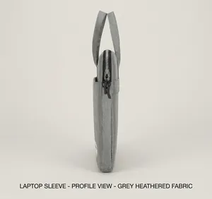 Side view of gray fabric laptop bag with black zipper, handle, and side pocket detail