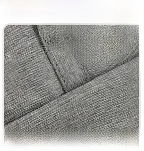 Detailed close-up of reinforced stitching on gray textured laptop bag handle