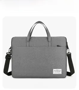 Front view of grey laptop bag with durable oxford fabric, handles and detachable shoulder strap