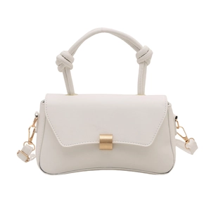 Minimalist white crossbody bag with curved base and knot design handle for women