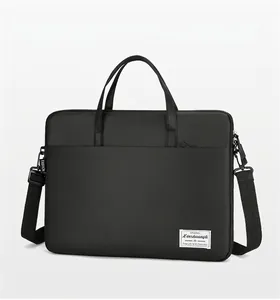 Close-up of durable black oxford fabric and adjustable shoulder strap on laptop bag