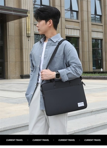 Detail view of a slim laptop bag featuring durable nylon material and adjustable shoulder strap