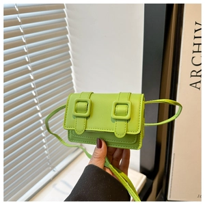 Detail of fruit green mini crossbody bag with double buckle flap and matte finish