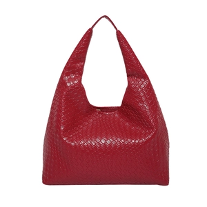 Classic red woven leather hobo tote bag with a spacious interior and top handle