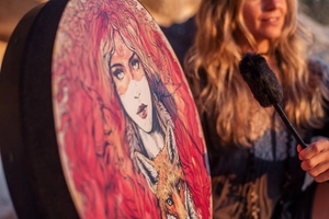 Artistic Shaman drum featuring lady and fox design with a black drumstick
