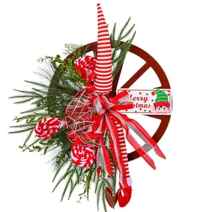 Christmas wheel wreath with pine needles, red berries and Merry Christmas sign decor