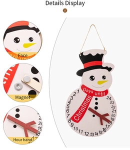 Close-up of wooden snowman countdown calendar with magnetic pointer and 24-day scale