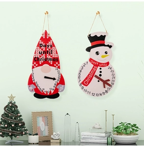 Detail of wooden Christmas countdown calendars featuring Santa and Snowman with movable pointers