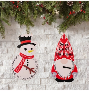 Detail of wooden Christmas countdown calendar ornaments with snowman and gnome designs
