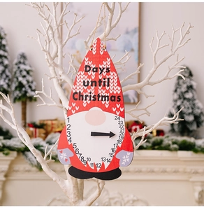 Detail of wooden Christmas countdown plaque featuring a gnome and adjustable pointer