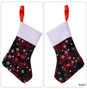 Mini plaid Christmas stocking cutlery holder with snowflake print and plush white trim