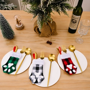 Christmas cat paw cutlery holders in red and green plaid for festive table decor