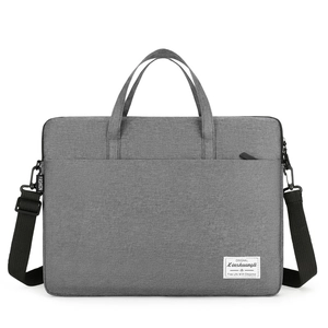 Slim grey laptop briefcase with top handle and shoulder strap for business travel
