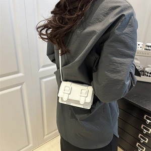Minimalist white square crossbody bag with double buckle flap for women in summer