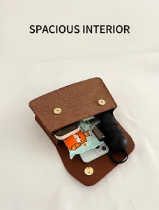 Interior view showing the large capacity of the brown woven textured crossbody bag
