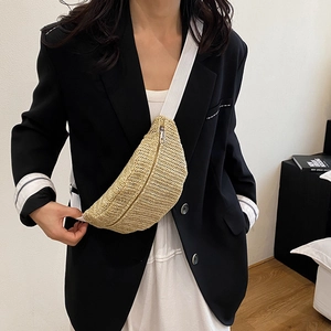 Handmade woven straw crossbody bag with white fabric strap and moon shape for summer beach