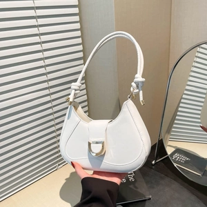 White hobo shoulder bag in glossy patent leather with gold buckle and knot strap detail