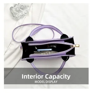 Interior capacity detail of the purple tote bag with zipper compartment and daily essentials