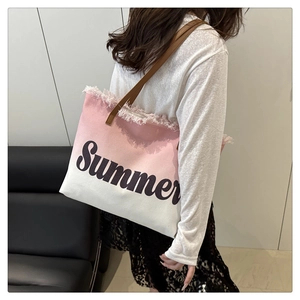 Detail of frayed fringe edges and Summer print on pink gradient canvas tote bag