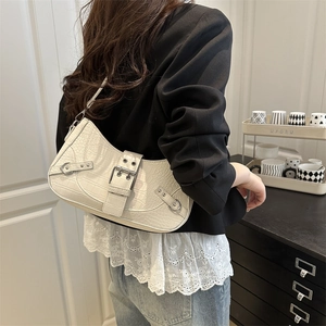 White crocodile pattern half-moon shoulder bag with moto-style rivets and metallic hardware