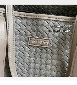 Detail of woven leather tote bag with embossed ZSKE PARIS logo on rectangular patch