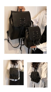 Detail eines schwarzen Kunstleder Rucksack-Sets mit schicker Schleife und Ösen Verzierungen