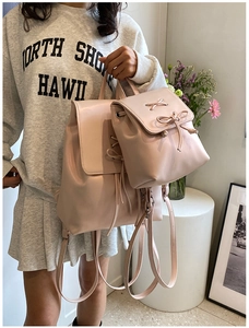 Detail von hellrosa PU-Leder Rucksack Set mit eleganter Schleife und Kordelzugverschluss