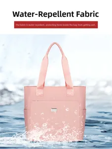 Pink waterproof oxford tote bag detail showing high-density splash-resistant fabric