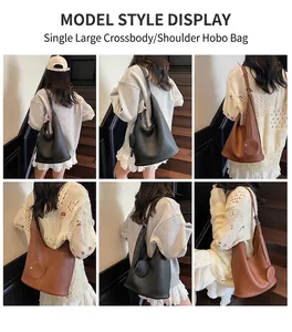 Litchi texture bucket bag shown in black and brown finishes with wide shoulder strap