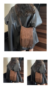 Detail of vintage brown suede tassel bag with long fringes and slender rope shoulder strap