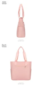 Detail view of pink nylon tote bag showing side pocket and hidden back zipper pocket