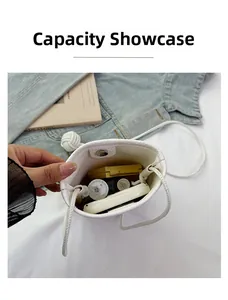 Capacity display of white phone bag showing space for smartphone and cosmetics