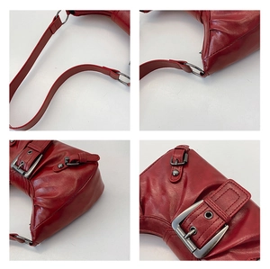 Detailed views of dark red vintage shoulder bag with silver buckles and studs