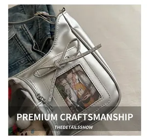Detail of silver mirror PU leather shoulder bag with bow and clear anime card slot