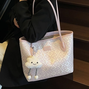 Ethnic style light pink tote bag with geometric maze pattern and cloud plush charm