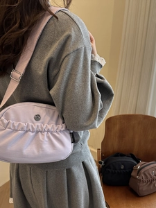 Chic light purple pleated nylon crossbody bag with adjustable wide shoulder strap for women