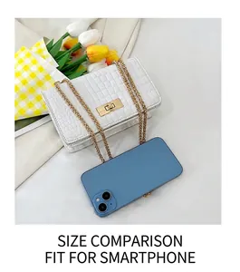Detailed top view of white stone pattern small square bag with golden chain and phone for scale