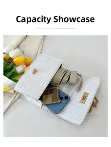 Capacity display of white stone pattern small square bag showing phone and umbrella inside
