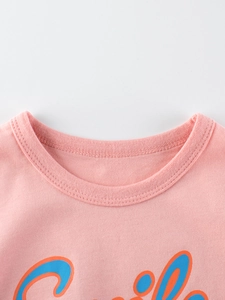 T-shirt rose en coton pour fille avec imprimé Smile et col rond à finitions côtelées