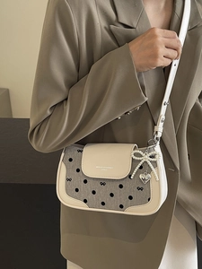 Chic cream polka dot baguette shoulder bag with pearl bow and heart charm for women