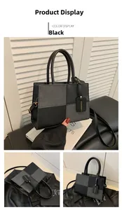 Detail of checkered patchwork handbag with adjustable strap and decorative fashion tag