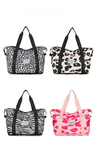 Four patterns of large travel bags including leopard, dots and zebra prints