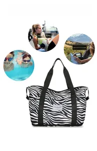 Detail of zebra pattern travel bag with dual handles and fitness scene illustrations