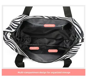 Internal detail of travel bag with zipper pocket and dual slot pockets for organization