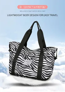 Close-up of zebra pattern travel bag with water-resistant fabric and lightweight feel