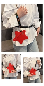 Macro detail of red star-shaped leather purse with colorful LOVE strap on jeans