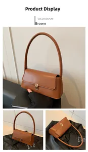 Détail du sac à bandoulière en cuir marron avec fermoir doré élégant et style rétro